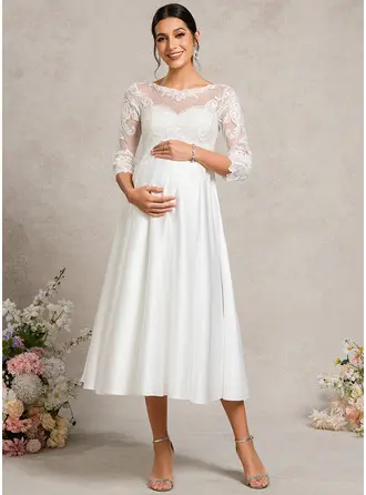 Robes de grossesse trapèze col bateau col illusion longueur midi satin dentelle 