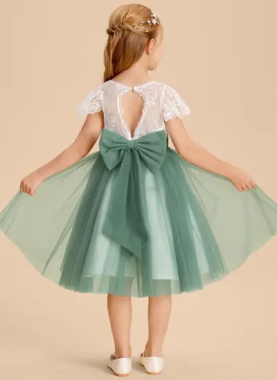 Robe trapèze avec nœud en tulle