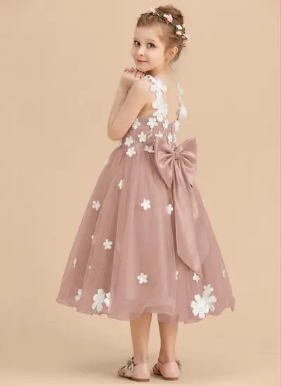 Vestido línea a desmontable con lazo de tul