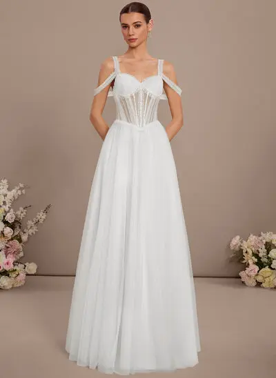 Robe princesse à col cœur multipositions en dentelle